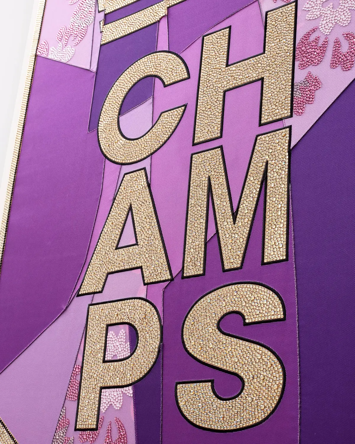 Detail of the “Championship Banner” by Mickalene Thomas, made with BIONIC yarn